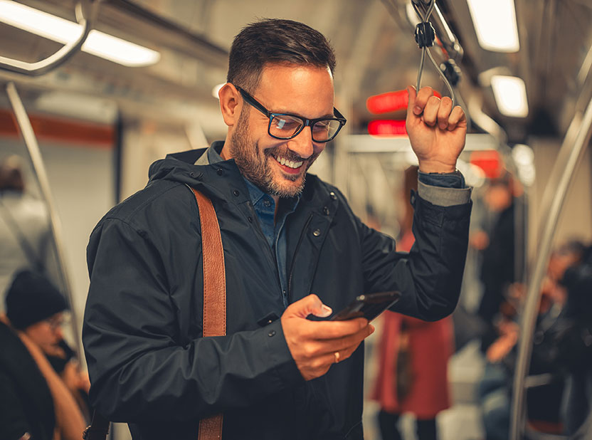 smiling man on train smiling man on train